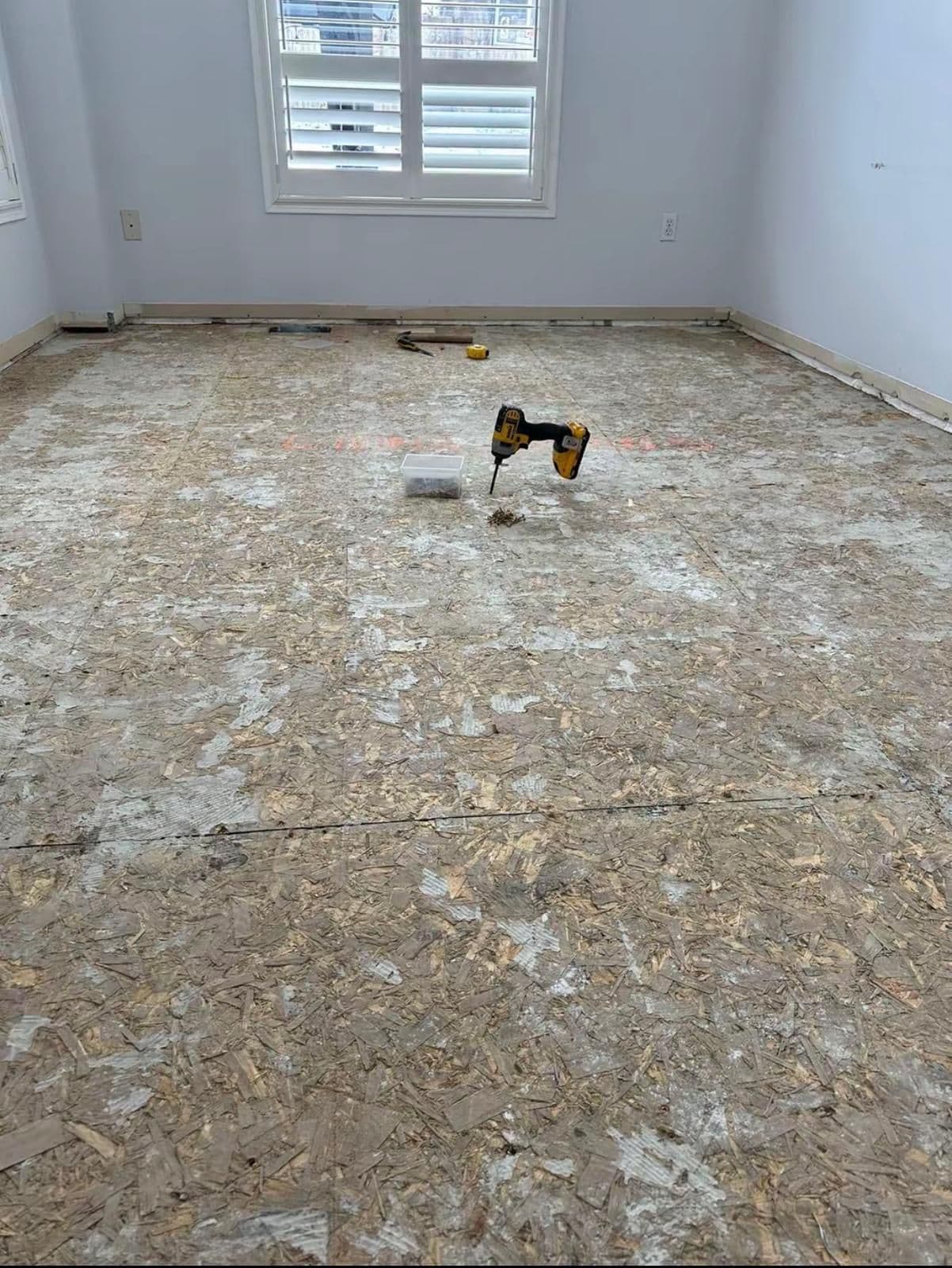 Bare subfloor cleaned and prepped before new vinyl plank goes down, Brampton