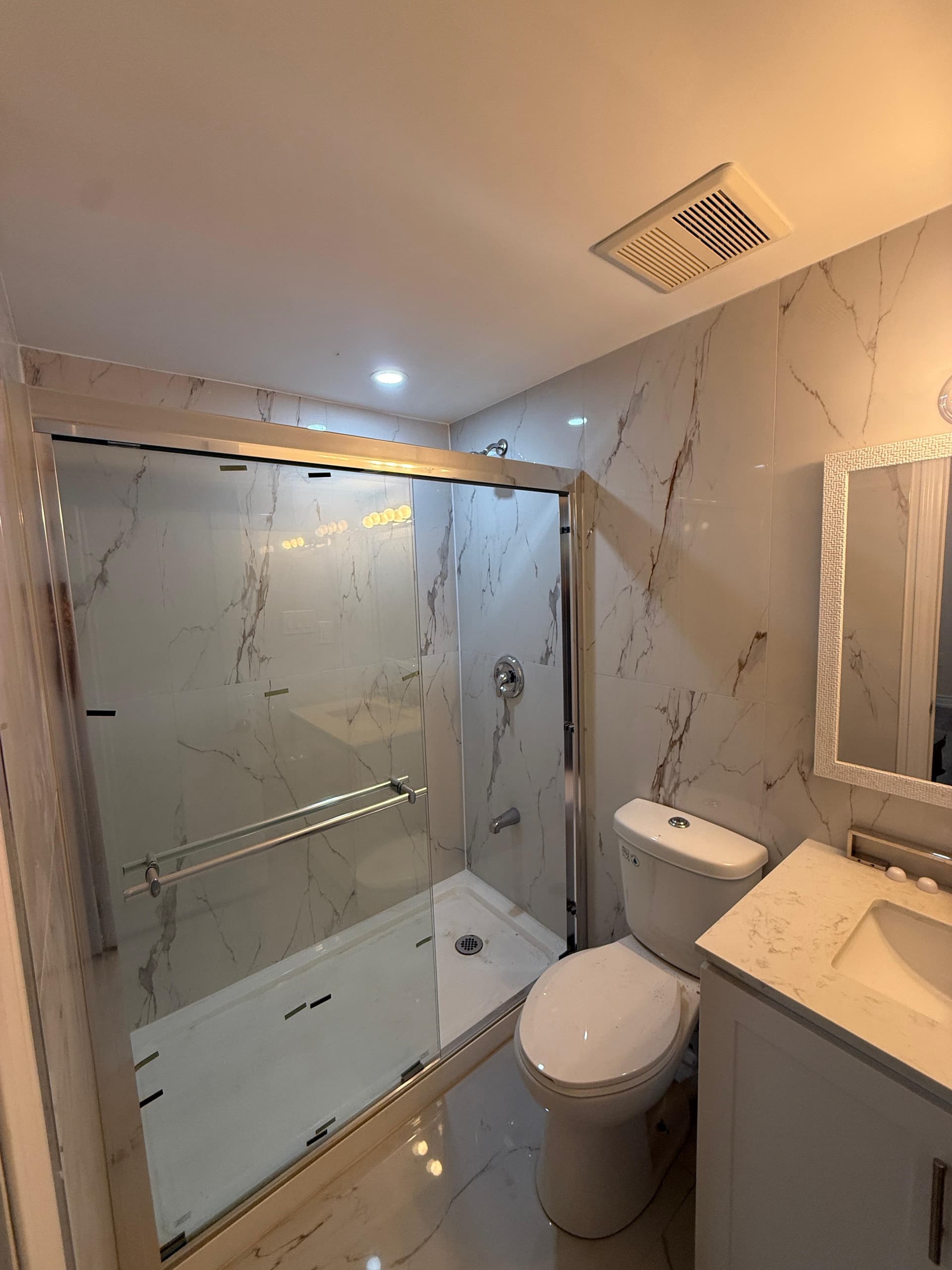 Calacatta Bathroom Renovation in Heart Lake, Brampton by Anand Renovation